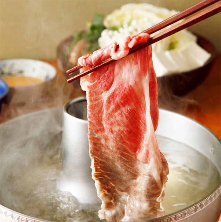 Cooked shabu shabu meat at one of the best restaurants in Tokyo called Aobaya