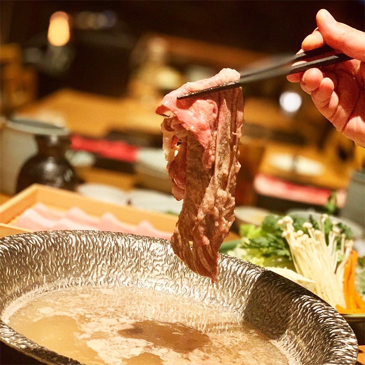 Image of shabu shabu meat being cooked at Nabezo in Tokyo